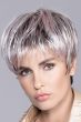 Woman in a brushed forward long grey and light pink pixie wig with dark roots