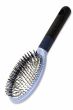 Large wig brush with bristles that loop around so they are more gentle on synthetic hair