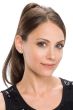 Woman in a 16" to 17" medium brown clip on straight ponytail hairpiece