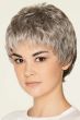 Woman in a light grey classic pixie wig with textured bangs