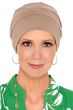 Woman in khaki cotton chemo hat in a beanie cap style