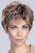 Woman in an ash brown long lace front pixie wig