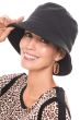 Woman wearing black bucket hat
