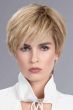 Woman in a 5" to 6" warm blonde wiglet hair topper for thinning hair