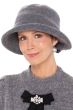 Woman in grey winter wool cloche hat with shapeable brim and bow on back