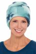 Woman in cute ribbed tie dye turquoise cuffed beanie hat for cancer patients