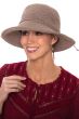 Woman in woven outdoor summer sun hat with big brim for cancer patients
