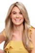Happy woman in extra long golden blonde lace front wig with highlights and long textured layers