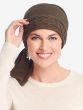 Woman in cotton knitted head wrap for cancer patients