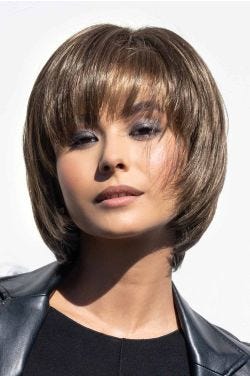 Woman in a past the chin feathered ash brown bob wig with shaggy bangs