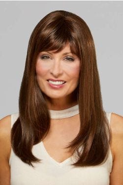 Woman in an extra long chestnut brown wig with long layers and side bangs