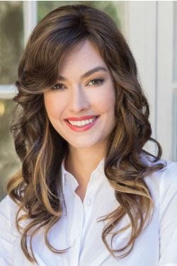 Woman in a 16"dark brown curly hair topper for thinning hair