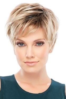 Woman in short straight blonde pixie cut wig