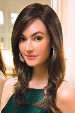 Woman in a long dark brown layered wig