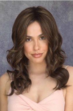 Woman in a past the shoulders curly medium brown lace front wig