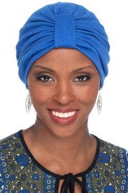 Woman in blue cotton blend basic turban for women with cancer