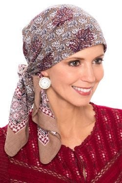 Woman in khaki printed hand stamped headscarf