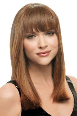 Woman with ginger brown blunt clip in bangs attached to her hair