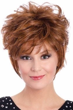 Woman in a long tousled medium red pixie wig