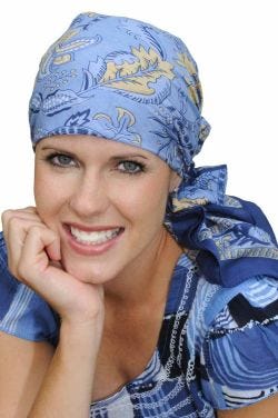 Woman in blue cotton head scarf