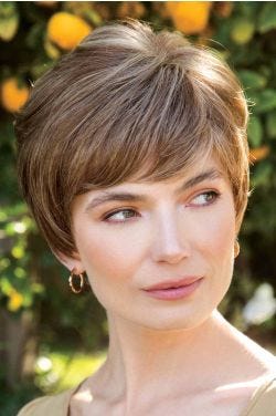 Woman in a long light brown lace front pixie with with side bangs