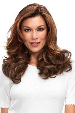 Woman in an 18" medium auburn human hair topper for thinning hair