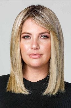 Woman in a 12" straight light blonde heat resistant hair topper for thinning hair