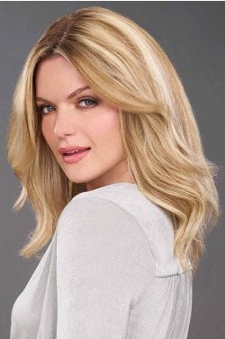 Woman in a 12" medium blonde hair topper for thinning hair