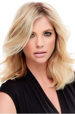 Woman in an extra large 12" blonde human hair topper for thinning hair