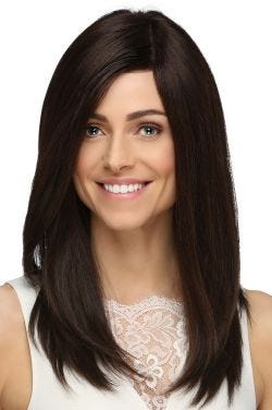 Woman in an extra long dark brown human hair wig