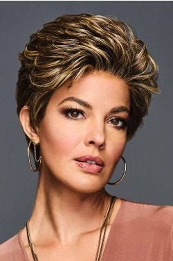 Woman in a light brown lace front pixie wig with choppy layers