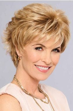 Woman in a short light auburn lace front wig with longer hair on top