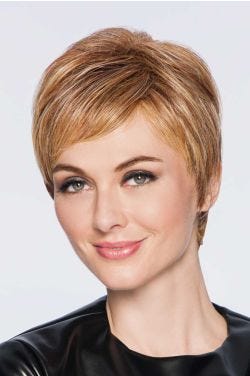 Woman in a layered short light auburn pixie wig with short side fringe bangs