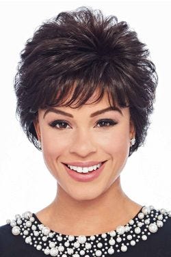Woman in a long full dark brown pixie wig with fringe bangs