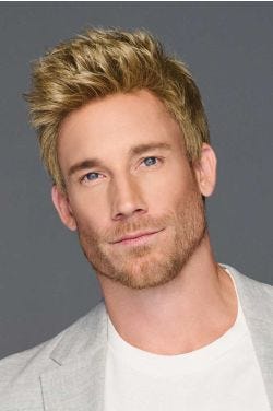 Man in a short ash blonde lace front wig with longer hair on top
