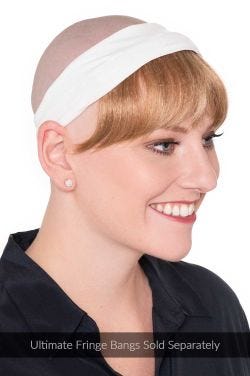 Bald cancer patient in headband with detachable bangs attached