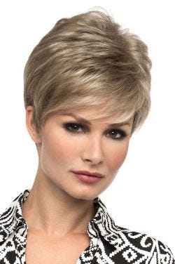 Woman in an asymmetrical blonde wig with textured side bangs