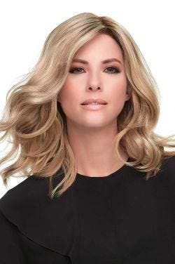 Woman in a 12" light blonde wavy lace front hair topper for thinning hair