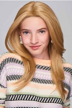 Young girl in an extra long warm blonde straight children's wig
