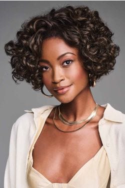 African American woman in a chin length dark brown curly lace front wig