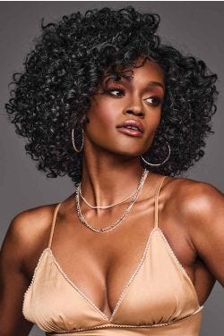 Afro American woman in a shoulder length curly black lace front wig