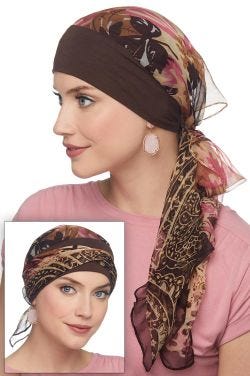 Woman in brown and pink pre tied head scarf for cancer patients with headband attached