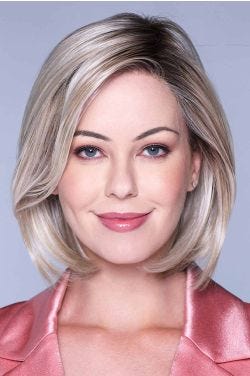 Woman in a past the chin light blonde lace front bob wig