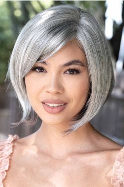 Woman ina past the chin salt and pepper angled lace front bob wig