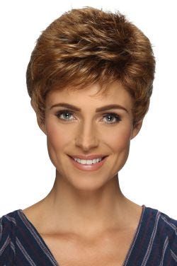 Woman in a petite classic light auburn pixie wig with fringe bangs