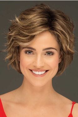 Woman in a chin length light brown curly layered lace front bob wig