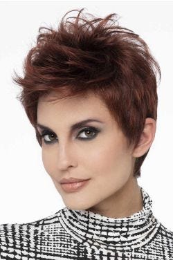 Woman in a tousled dark red pixie wig with longer layers on top