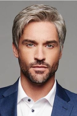 Man in a short evenly cut light brown and grey lace front wig