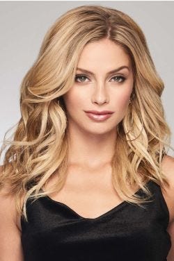 Woman in a 16" curly warm blonde hair topper for thinning hair