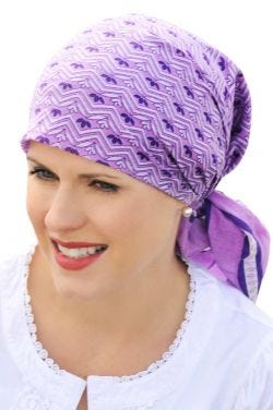 Woman in purple square cotton head scarf for woman with cancer